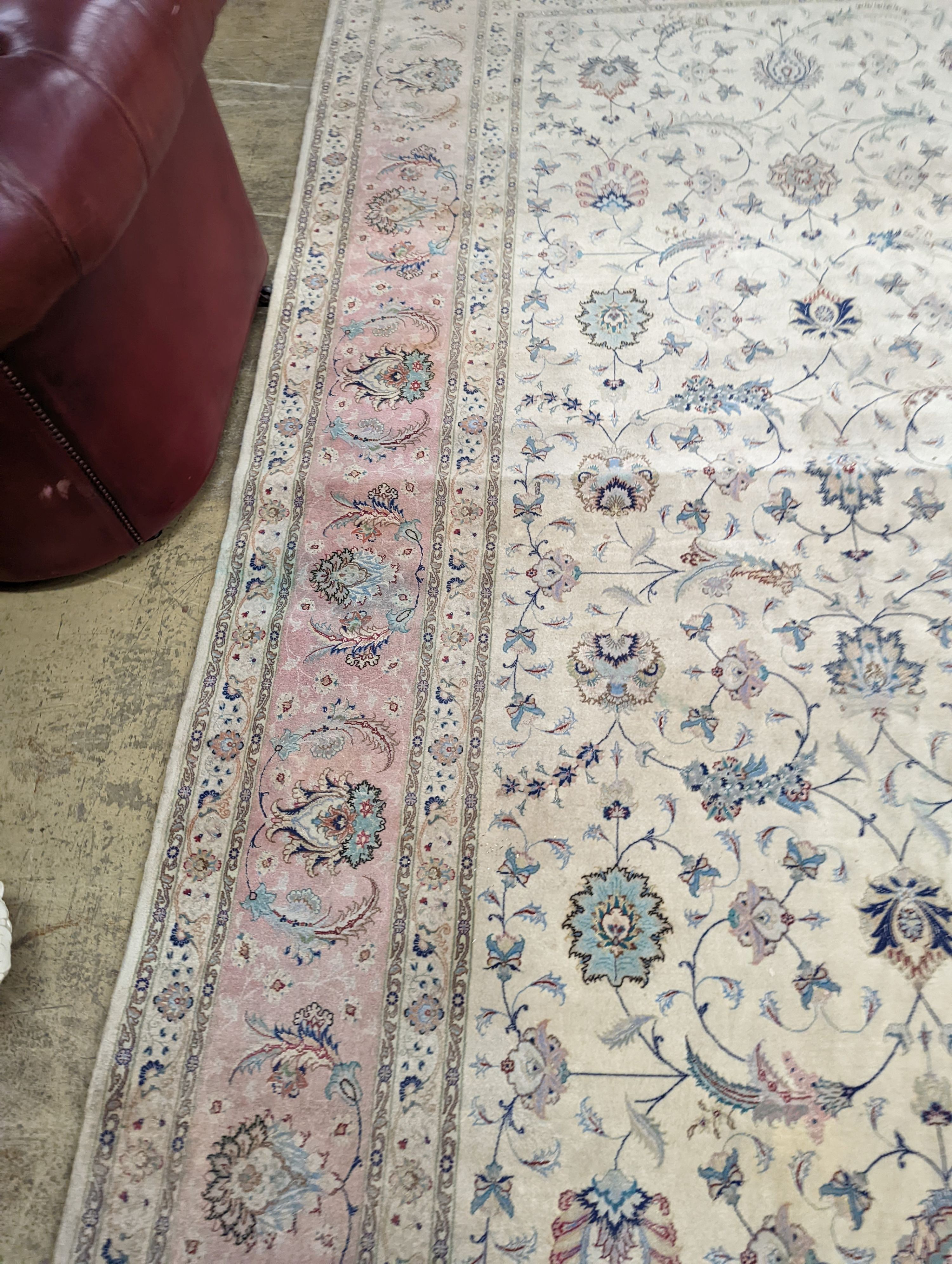 A Persian Tabriz ivory ground carpet, 410 x 300